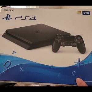 Like new PlayStation 4 Slim 1TB Bundle